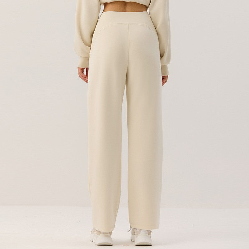 Beige cropped zip cardigan with stand-up collar and loose lantern sleeves, upper-body view.
