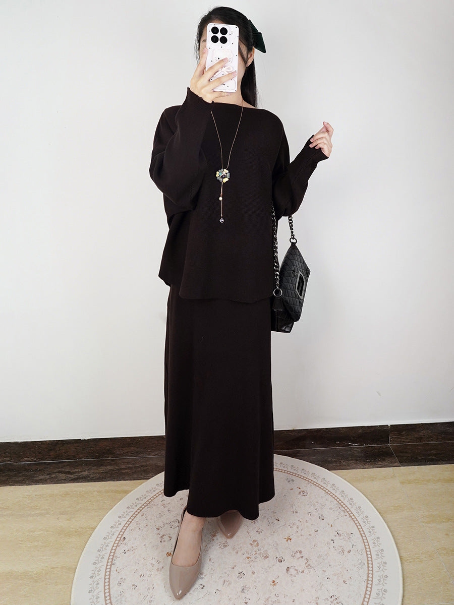 Women’s dark knit maxi skirt with elastic waist and A-line drape