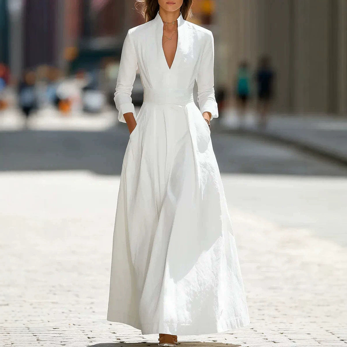 White V-neck maxi dress with wide belt, long sleeves and full long skirt