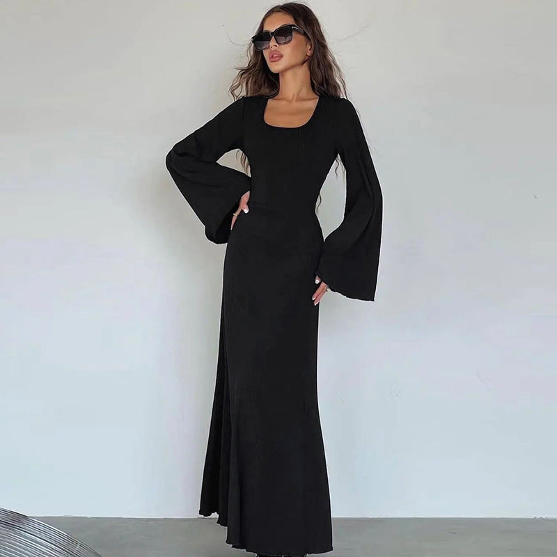 Ribbed knit maxi dress in black, scoop neck, long bell sleeves, fitted column