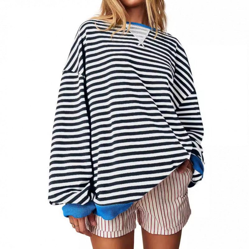 Women’s striped pullover sweatshirt with long sleeves and round neckline, navy and white.