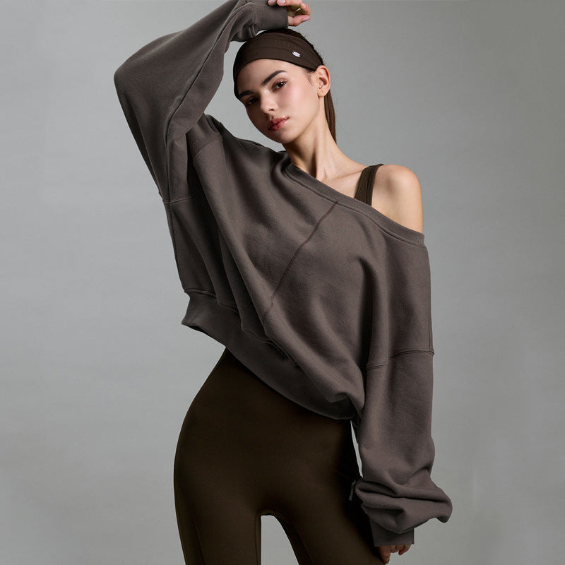Off-shoulder dark brown sweatshirt with wide neckline and long sleeves