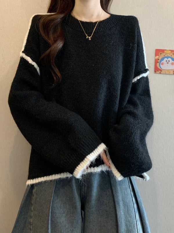 Black pullover sweater with white stripe cuffs and crew neckline