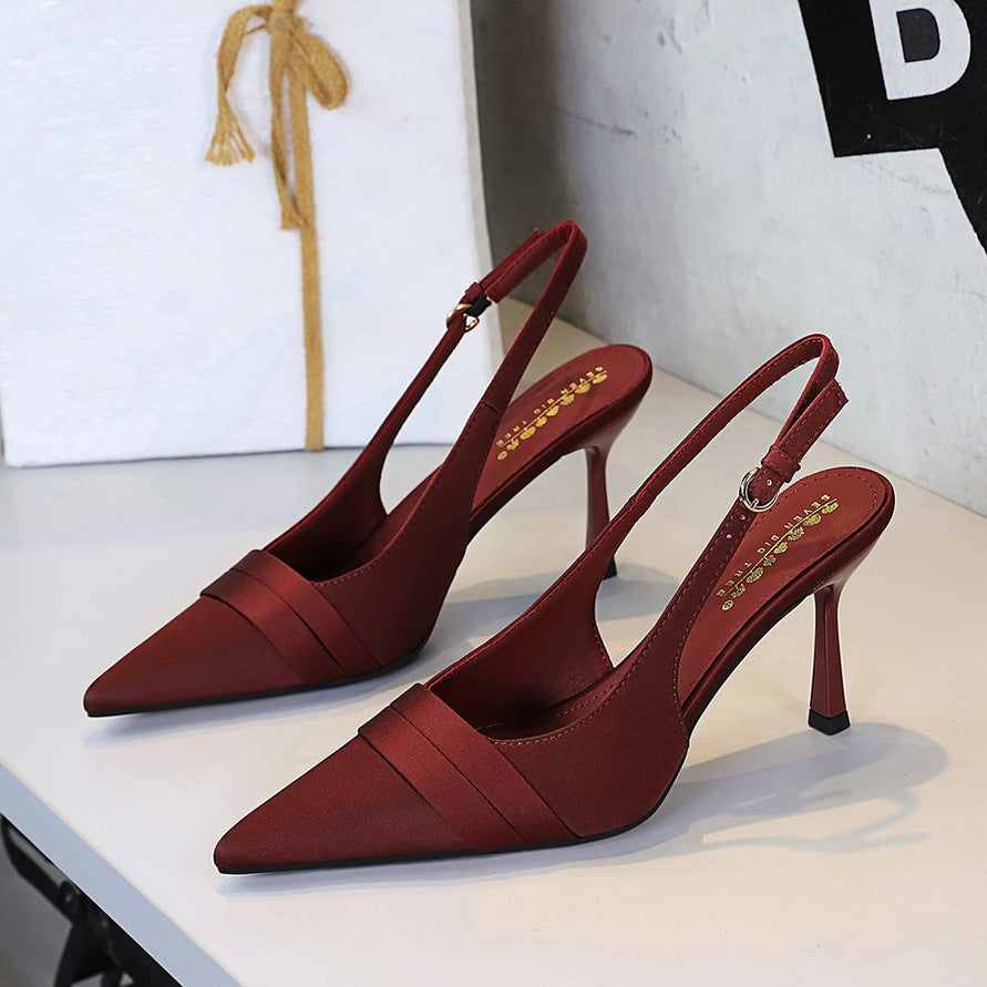 Wine red satin pointed-toe stiletto slingback heels with cut-out back strap