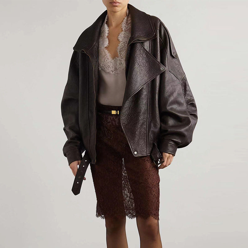 Black leather motorcycle jacket with double collar and snap detail, cropped