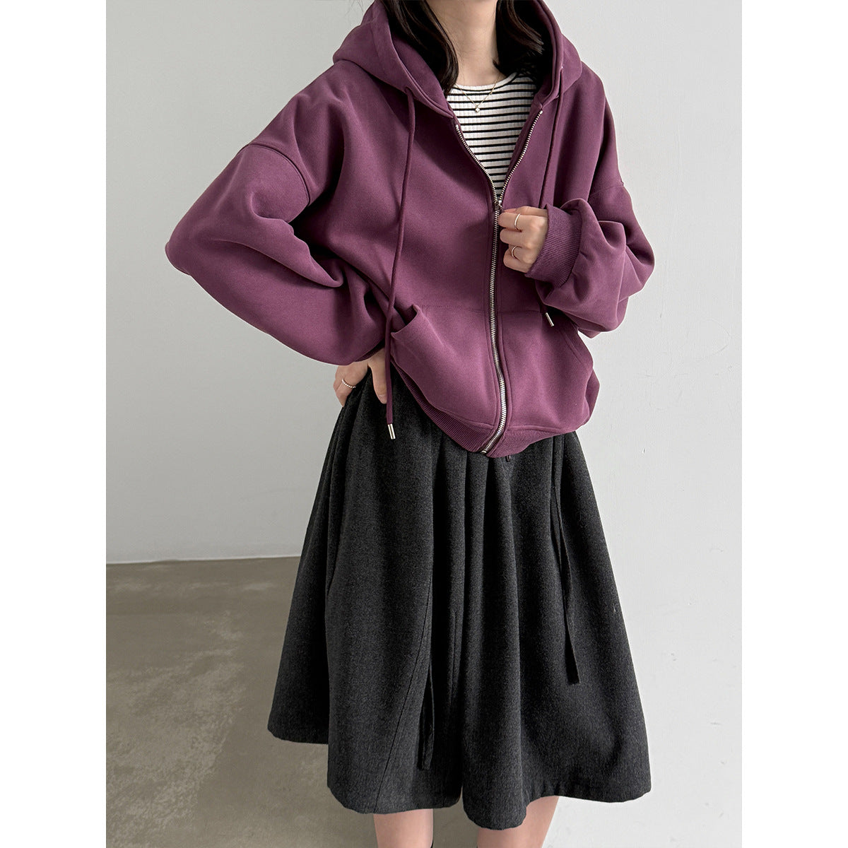 Women’s purple zip-up hooded sweatshirt with drawstring hood and front zipper