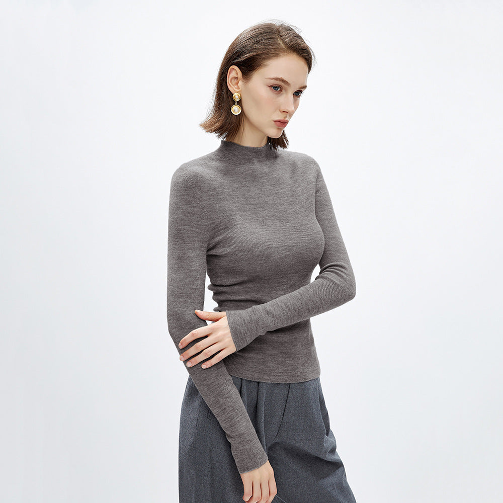 Light gray seamless merino wool knit sweater with semi-high collar, thin long sleeves