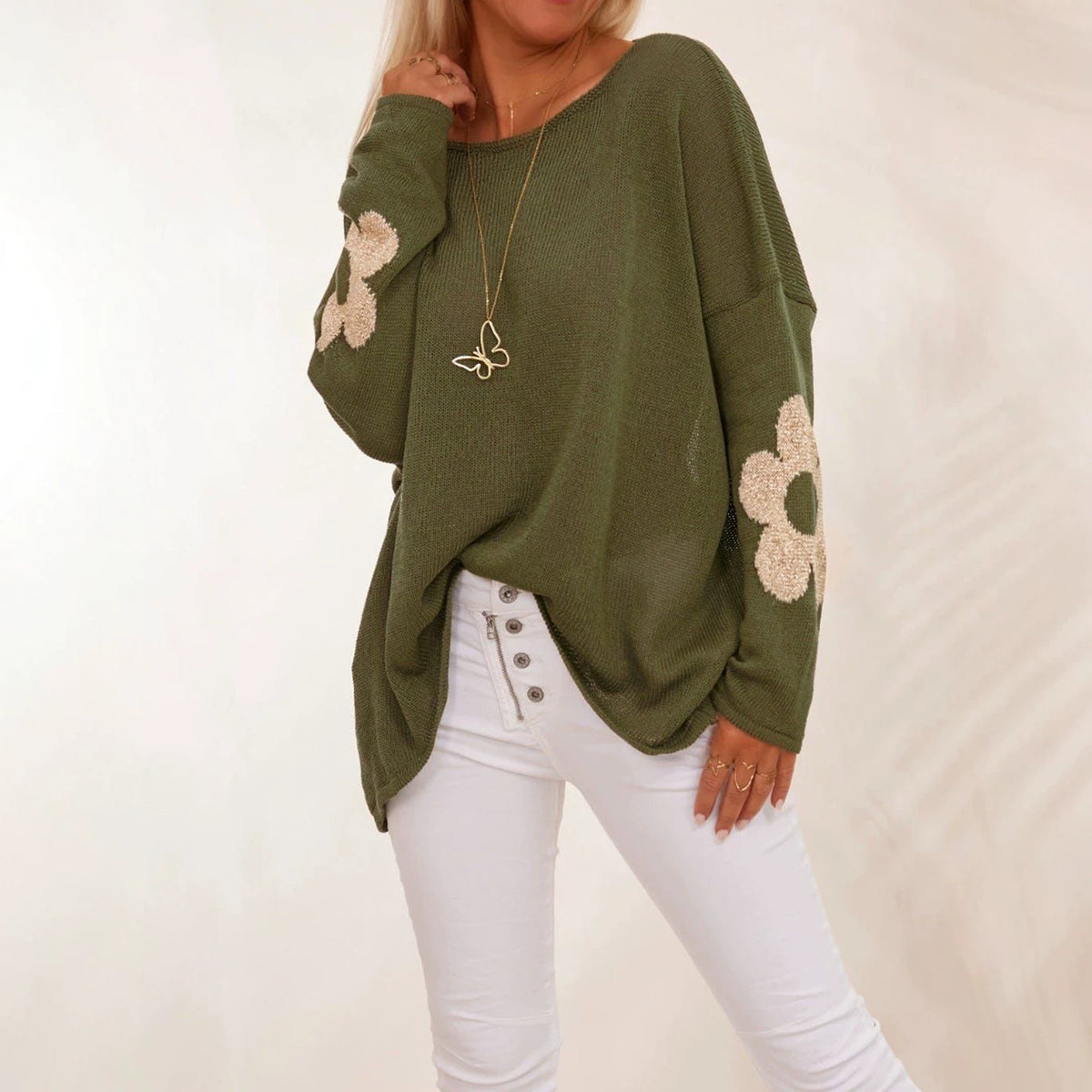 Green floral jacquard pullover sweater, round neck, loose fit, long sleeves.