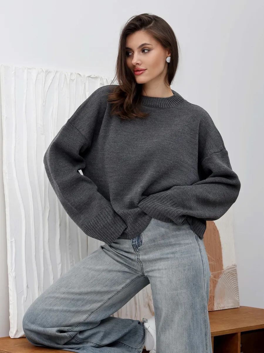 Gray oversized mock neck drop-shoulder sweater with ribbed hem and cuffs