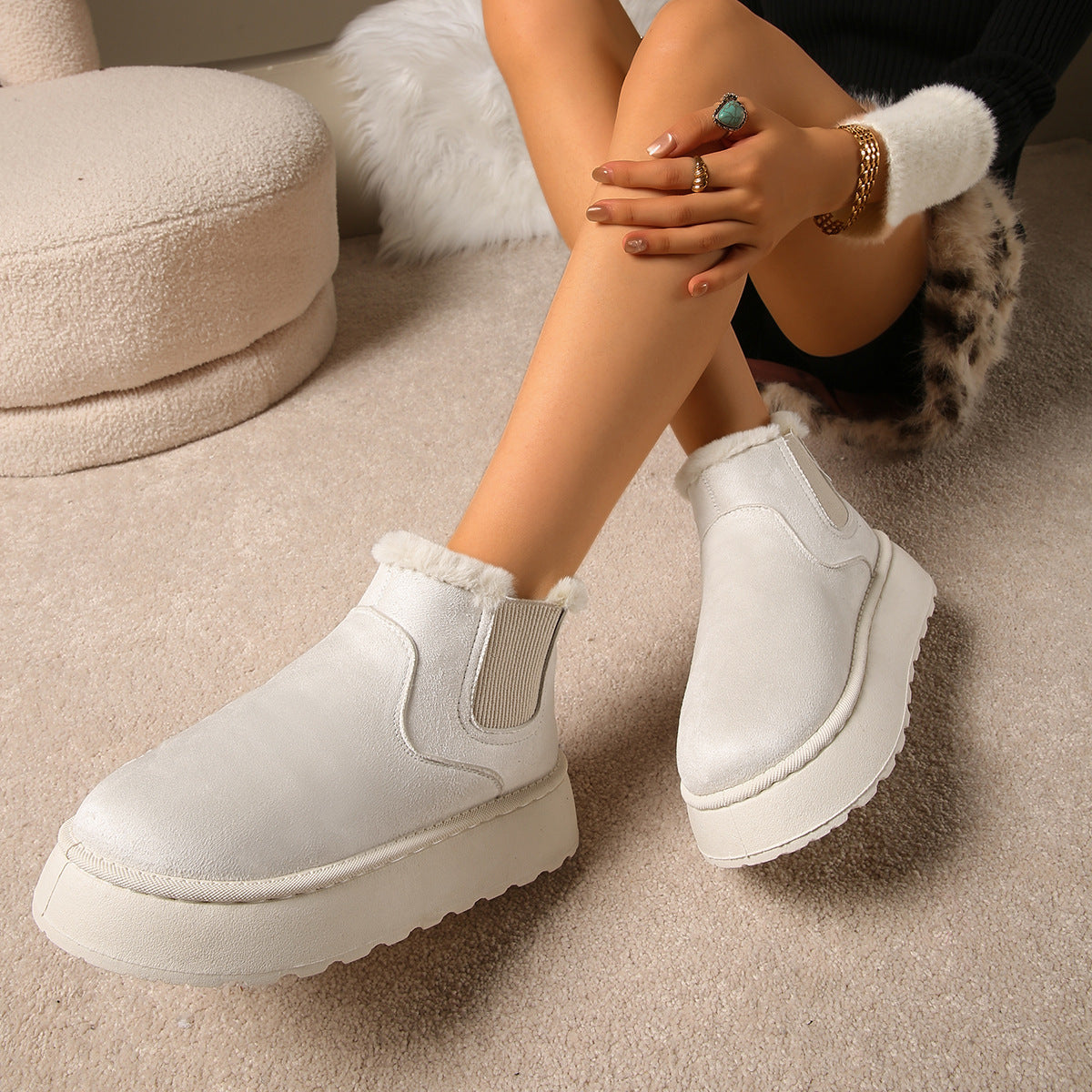 Women's white plush-lined ankle boots with round toe, elastic side gore, thick sole