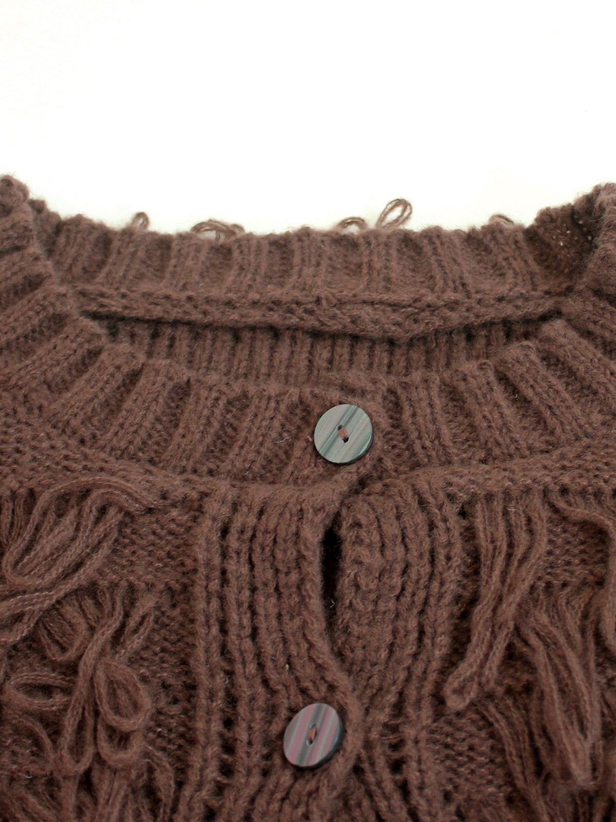 Brown knitted jacket collar with round buttons and textured cable-knit pattern