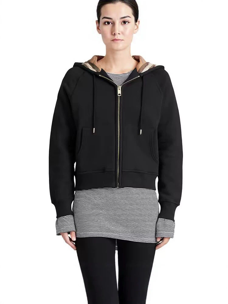 Black zip-up hooded sweatshirt jacket, long sleeves, striped hem, zip front.