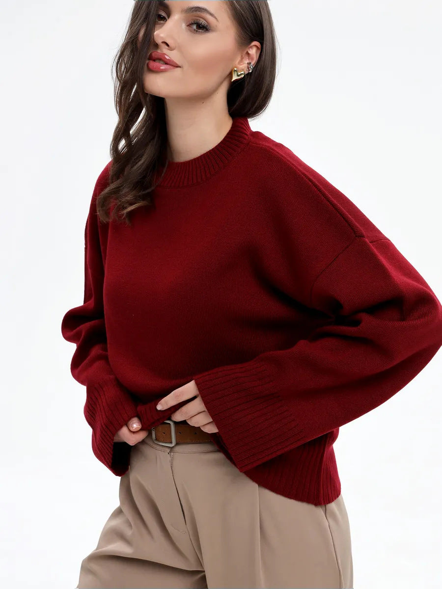 Red/burgundy oversized mock neck drop-shoulder sweater with ribbed cuffs