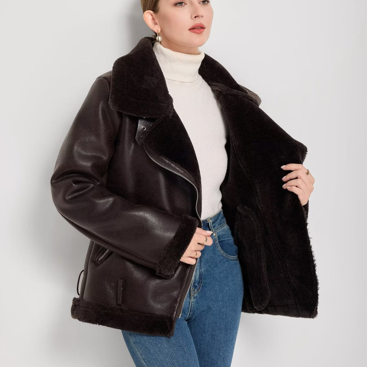 Women’s dark brown leather-look coat with faux-fur collar, open front and wide belt