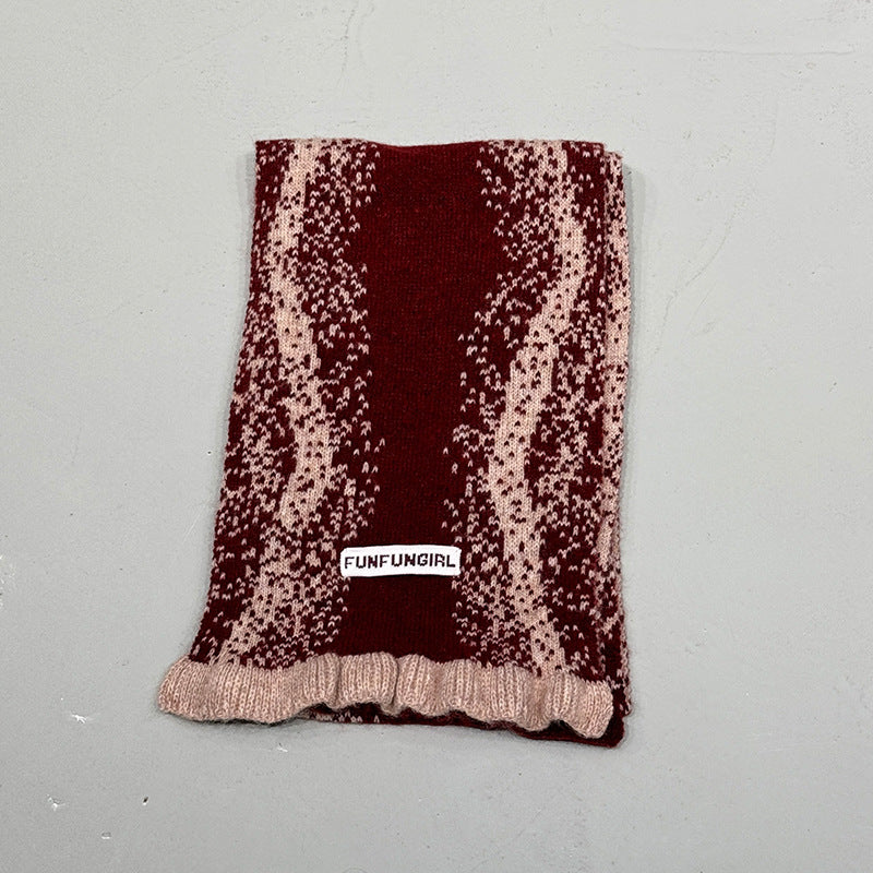 Maroon speckle knitted scarf with fringed bottom edge and label patch