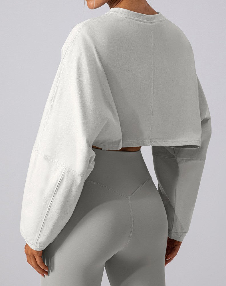 Women's cropped sweatshirt in white, long sleeves, loose relaxed fit