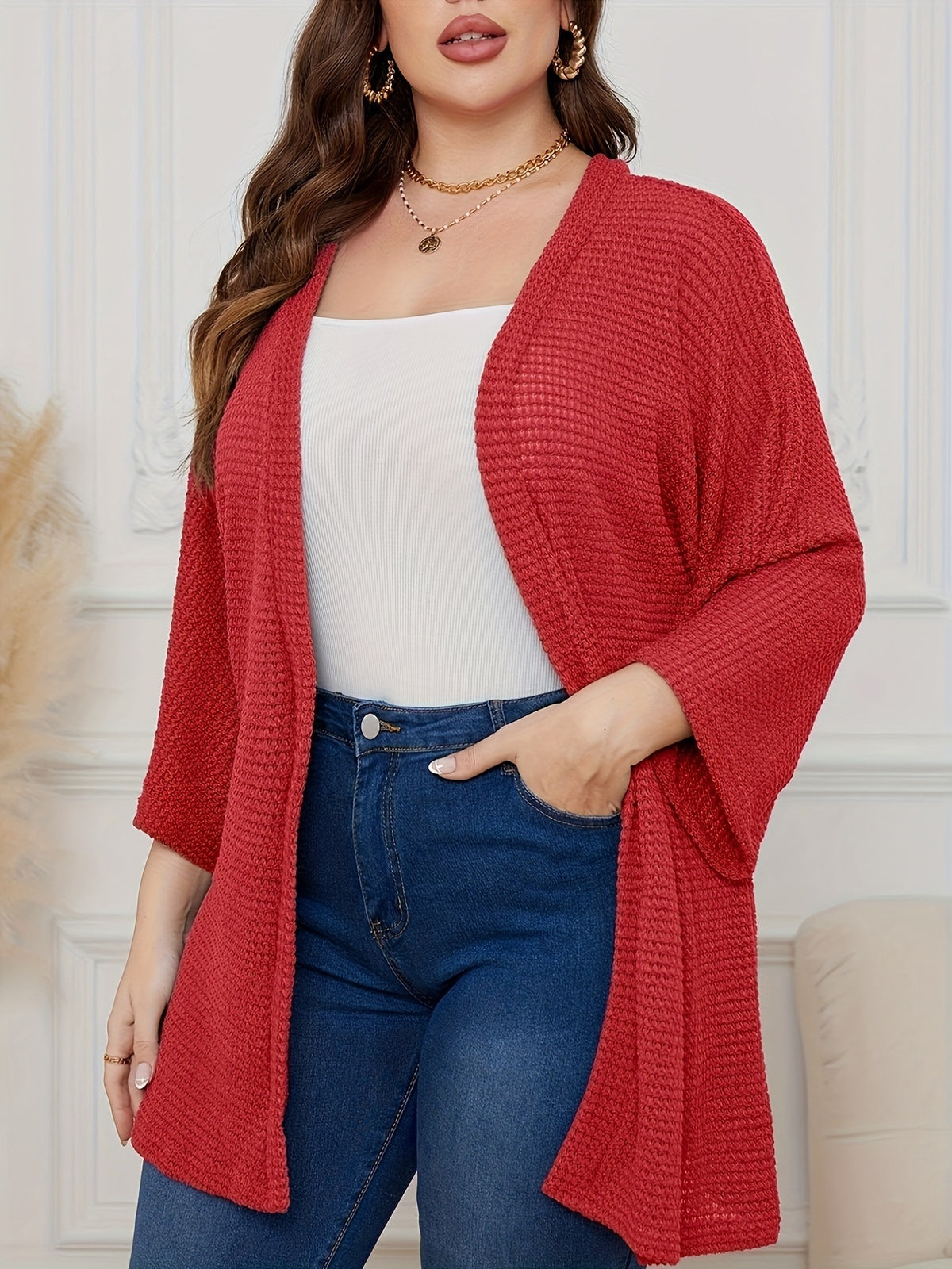 Women's loose textured knit cardigan with 3/4 sleeves, open front, red