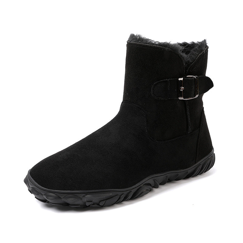 Black flat ankle snow boot with faux fur cuff and side buckle strap, rugged sole