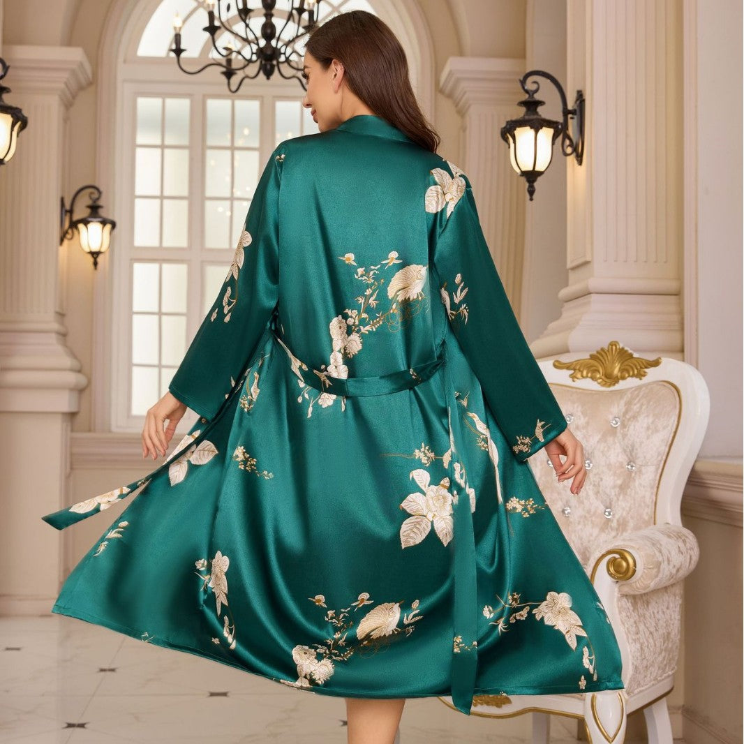 Green satin robe with floral back print, tie waist, long sleeves, flowing skirt