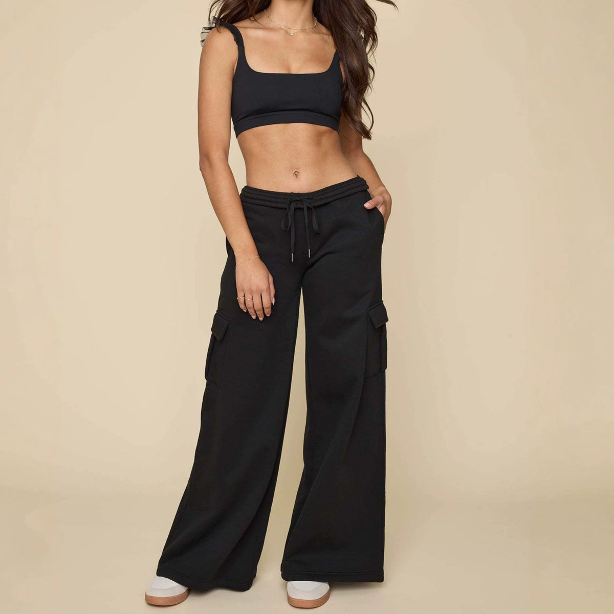 Black wide-leg cargo pants with drawstring waist and side cargo pockets