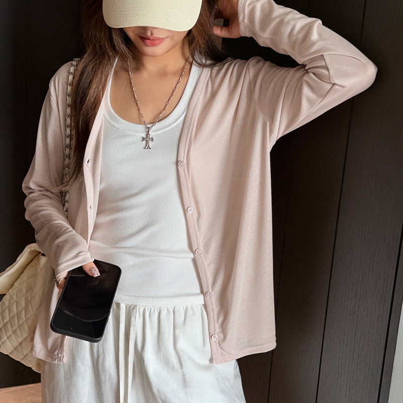 Lightweight cropped V-neck cardigan with one-button front in light beige, long sleeves