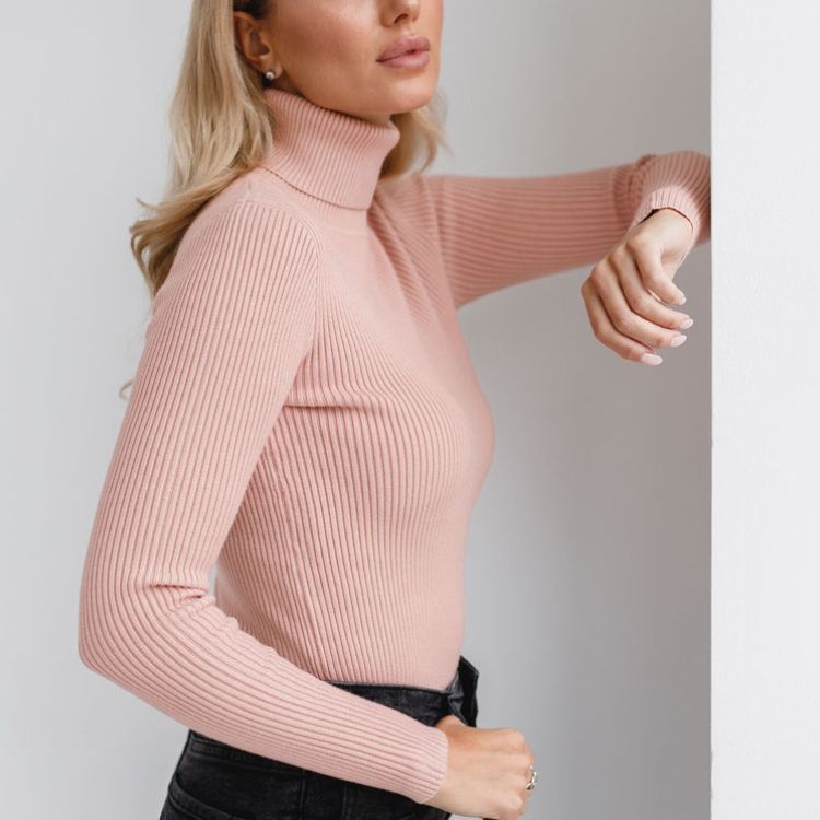 Blush pink ribbed turtleneck knit sweater with long sleeves