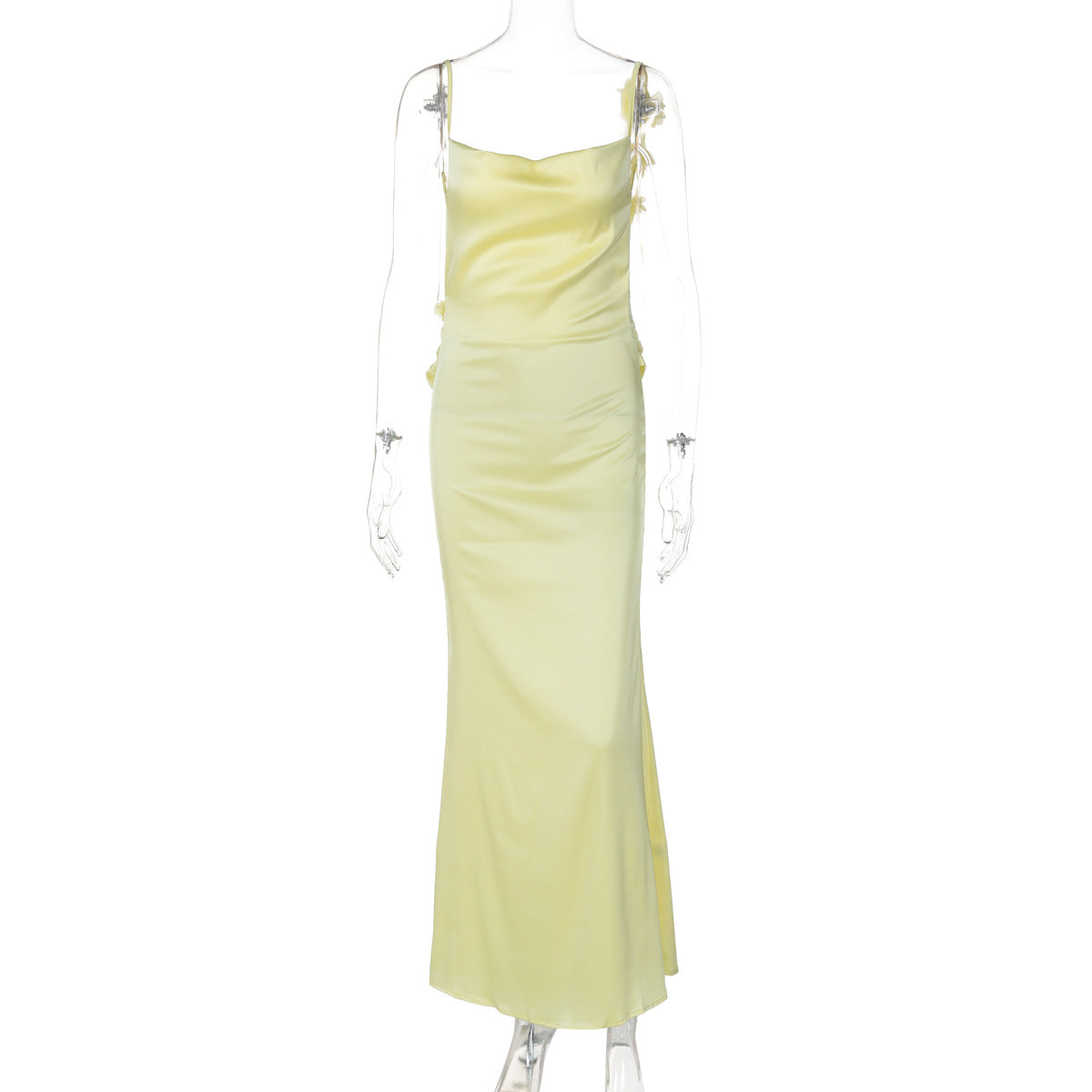 Yellow satin long slip dress with spaghetti straps and small floral detail at shoulders
