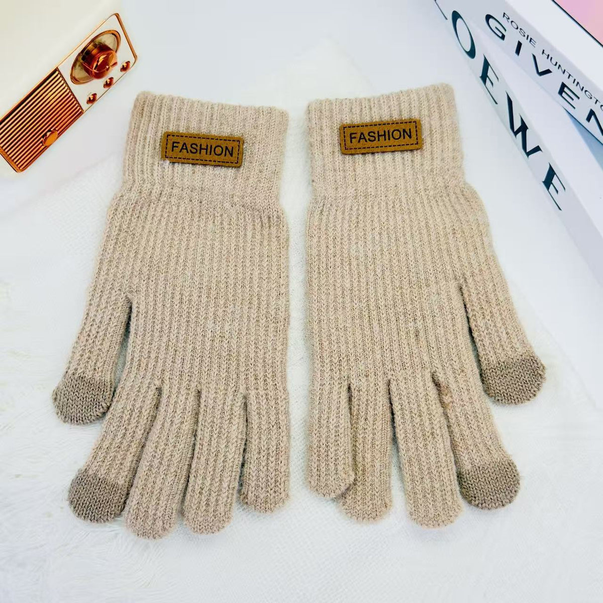 Beige knitted winter gloves with ribbed cuffs and five finger openings