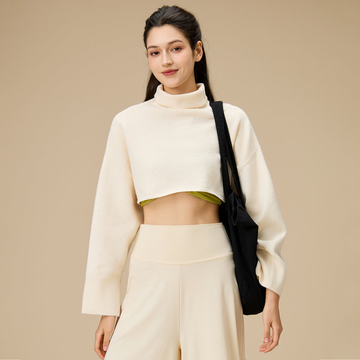 White cropped turtleneck yoga blouse with long sleeves and loose fit