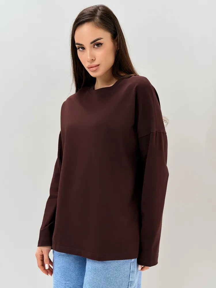 Brown round-neck top with long sleeves and a relaxed fit