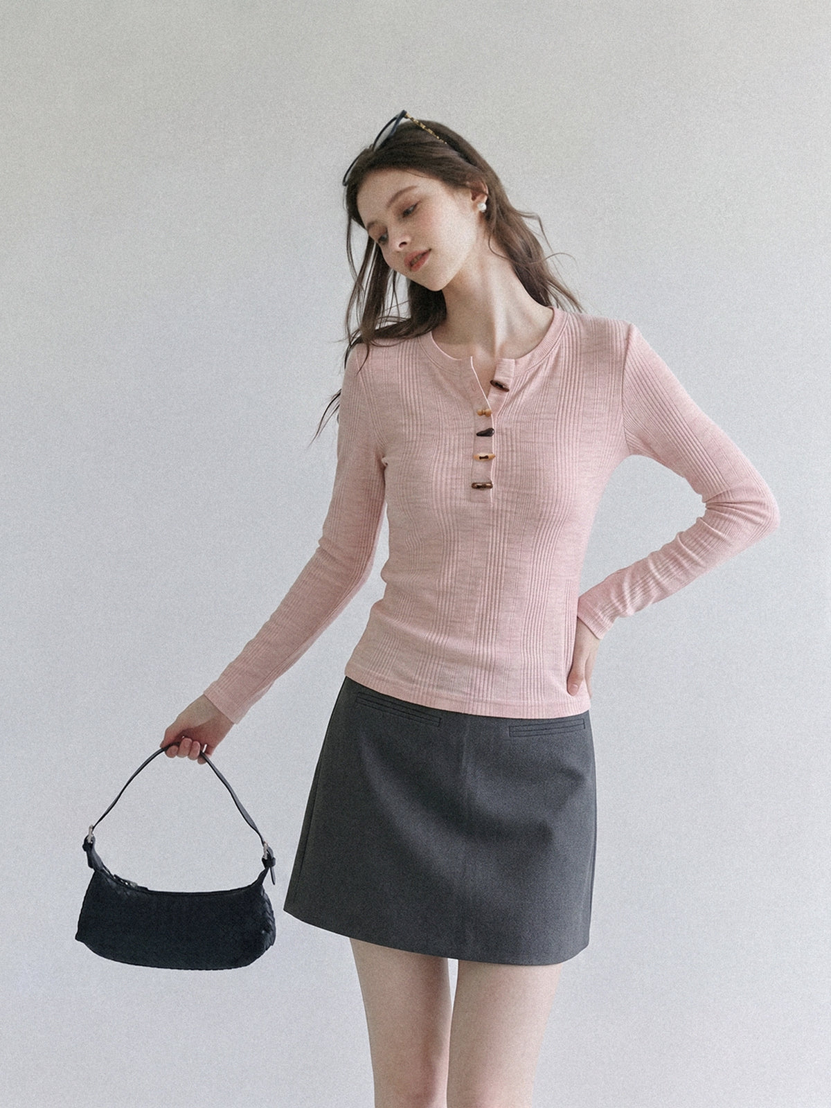 Women's pink ribbed long-sleeve henley T-shirt with horn-button half placket