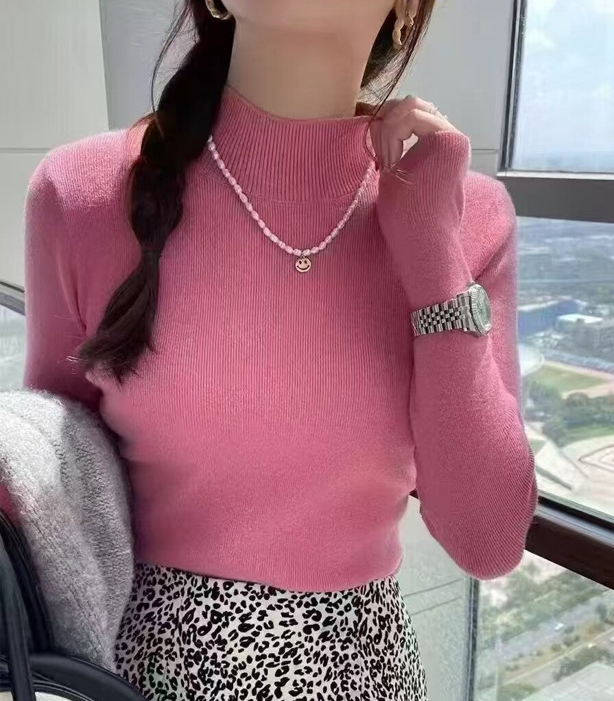 Pink women’s mock neck slim-fit long-sleeve knit top, ribbed collar