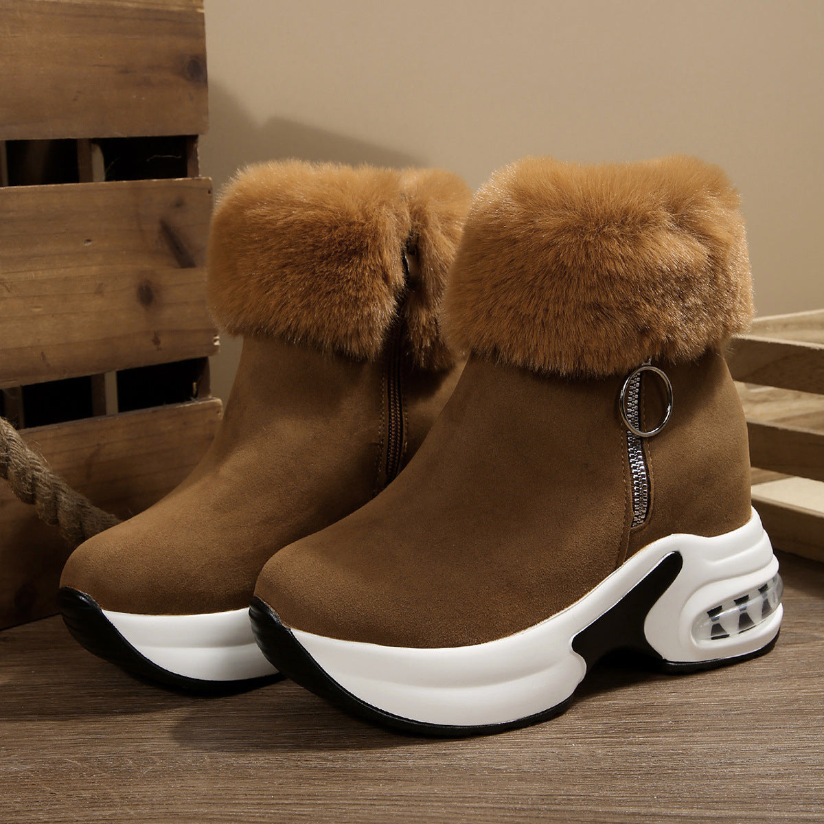 Brown fleece-lined snow boots with side zipper, faux-fur cuffs, chunky white platform sole