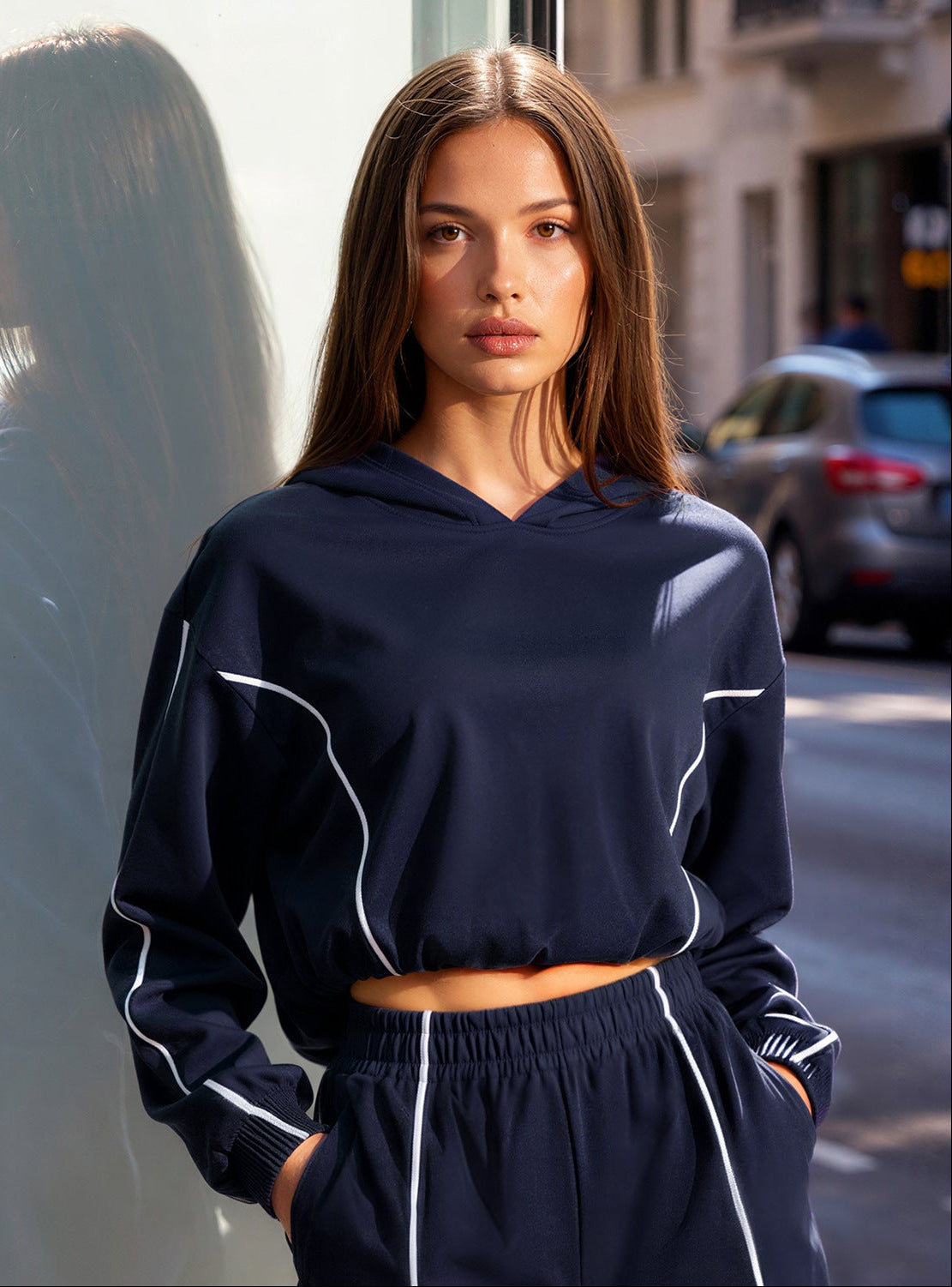Navy hooded sun protection jacket with contrast piping and long sleeves