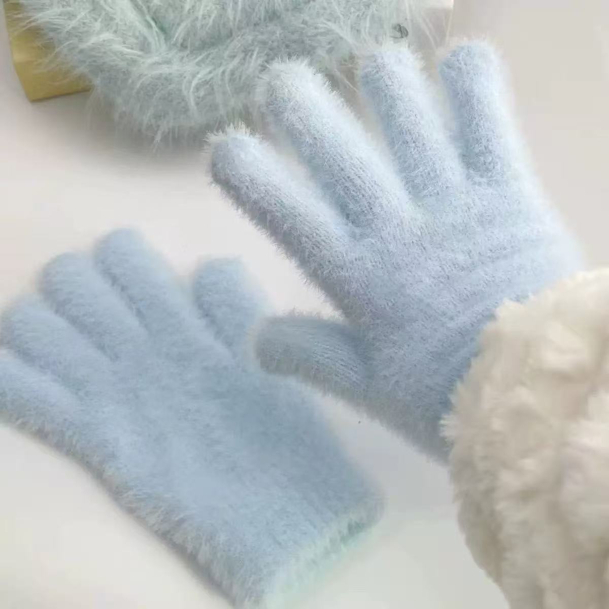 Light blue plush winter gloves with long cuffs