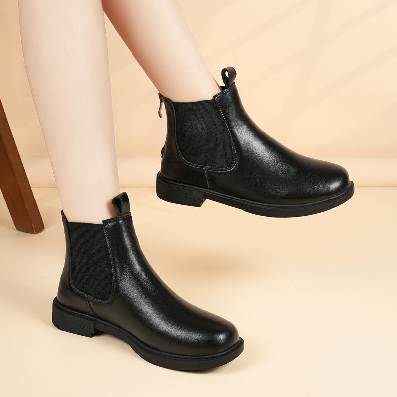 Black ankle boots with elastic side panels and low block heel