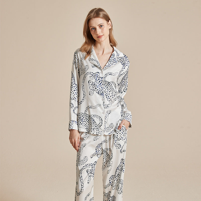 Women’s long-sleeve printed pajama set with white base and black animal motifs