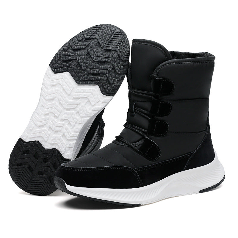 Black high-top snow boot with fleece lining, hook-and-loop straps, and thick tread sole