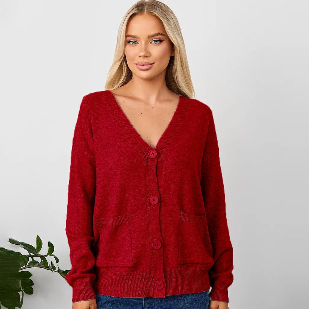 Women's red knit V-neck cardigan with button front and front pockets, long sleeves