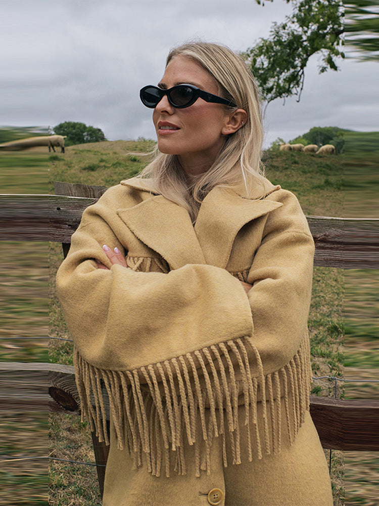 Women’s khaki lapel windbreaker coat with long tassel fringe and button at hem