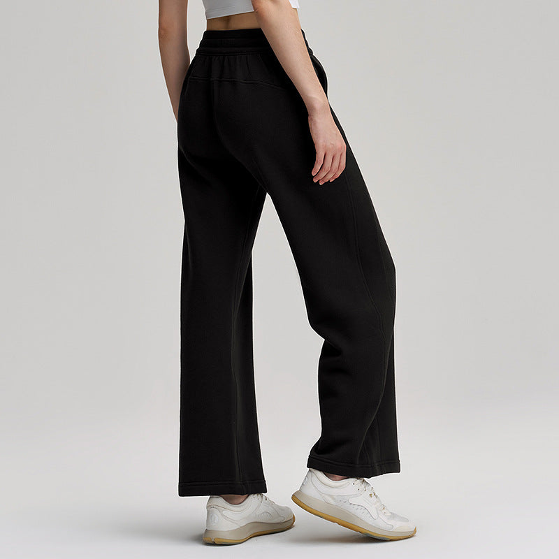 Fleece-lined wide-leg pants in black, mid-waist drawstring with relaxed straight legs