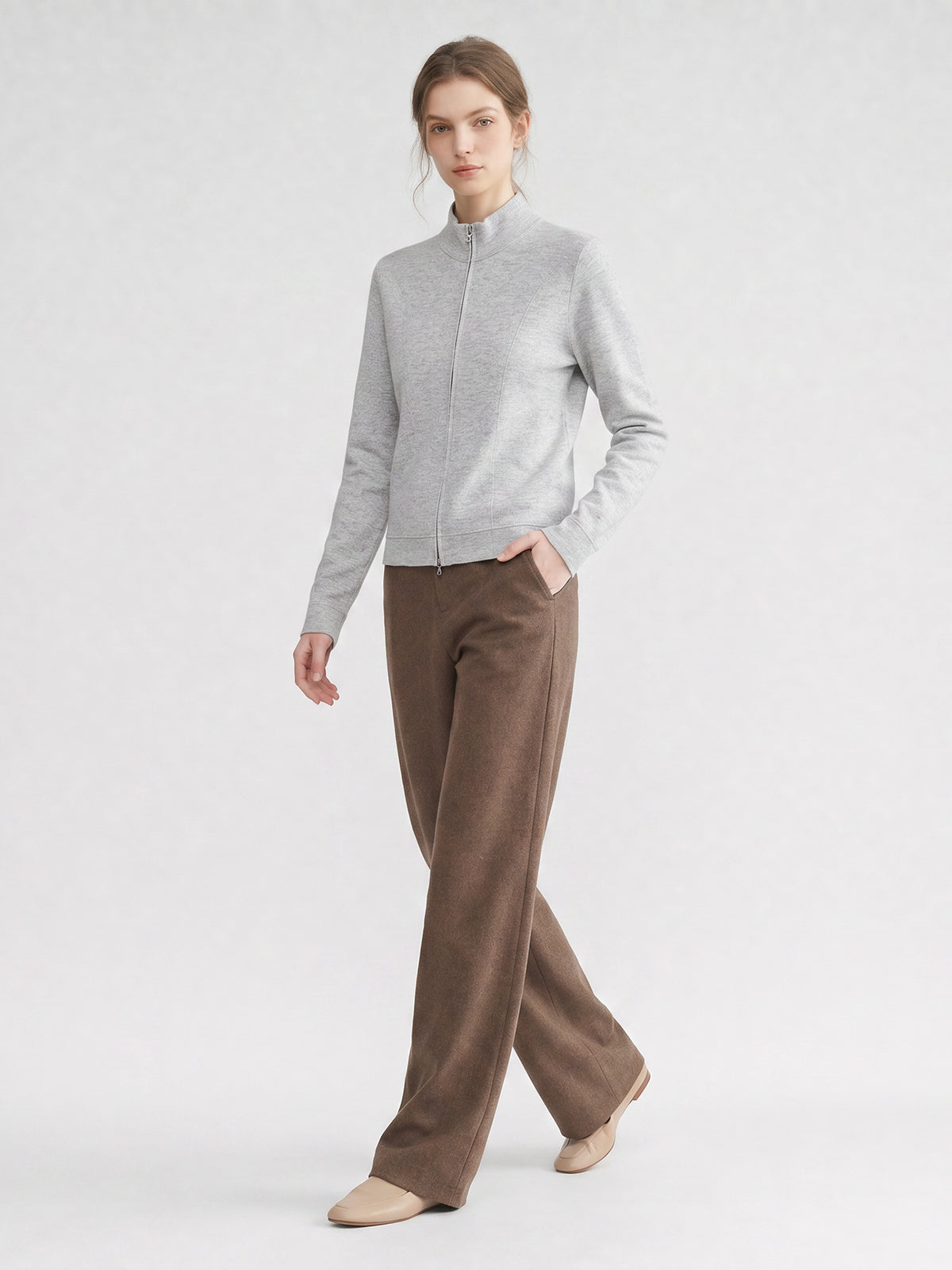 Women’s light gray knit cardigan with stand-up collar and front zipper
