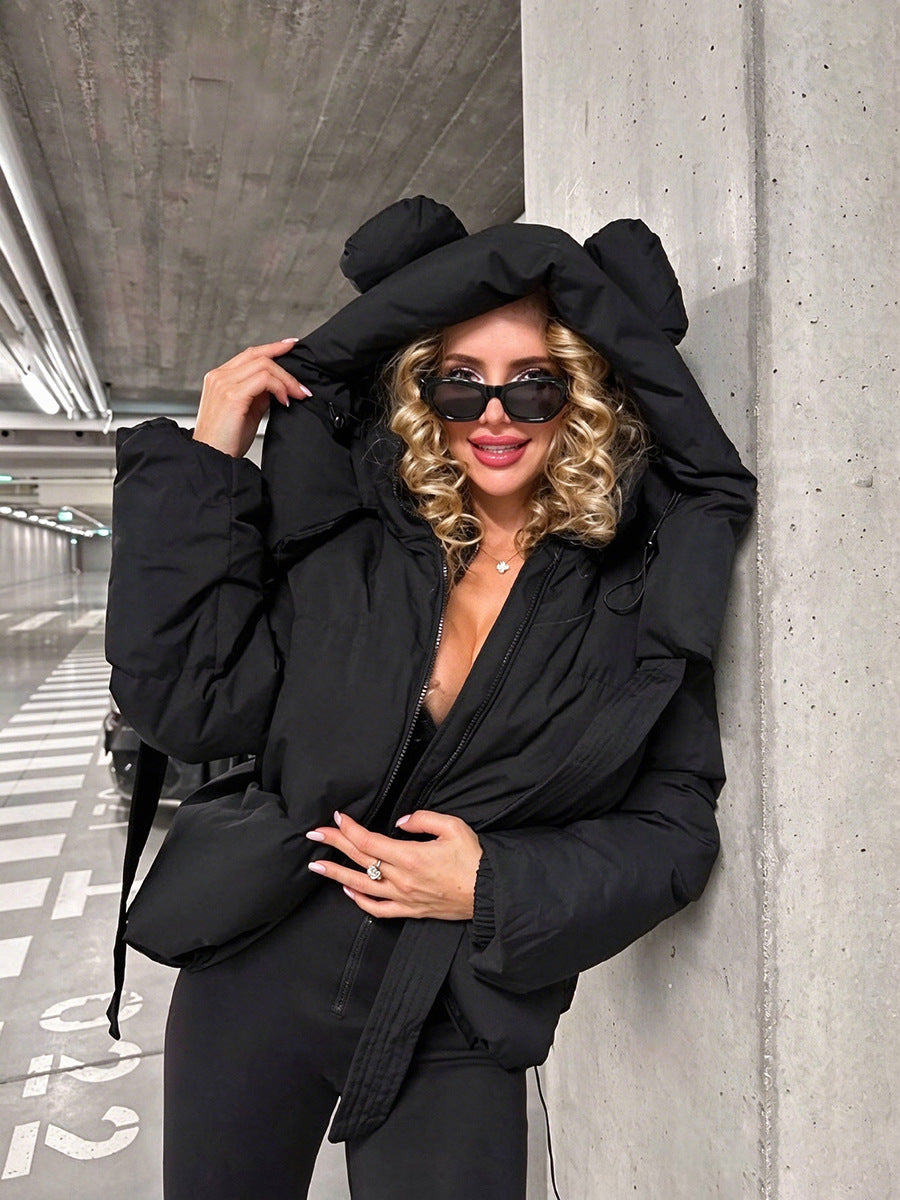 Black padded jacket with a hood featuring rounded ear details and long drawstrings.