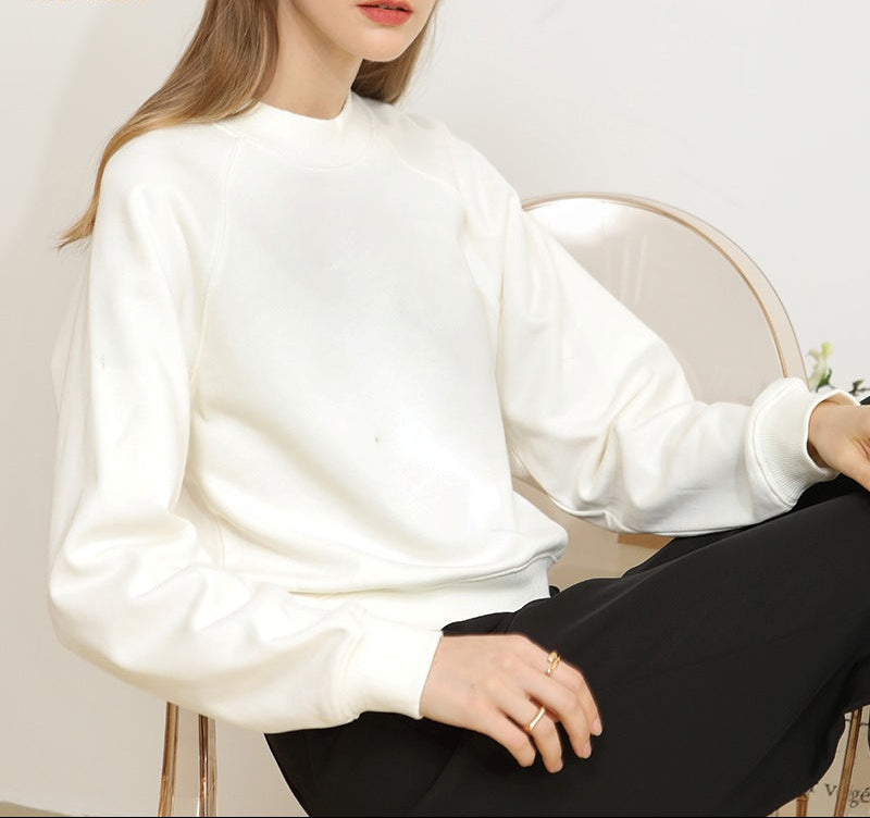 Off-white raglan-sleeve sweatshirt with crew neck, relaxed pullover
