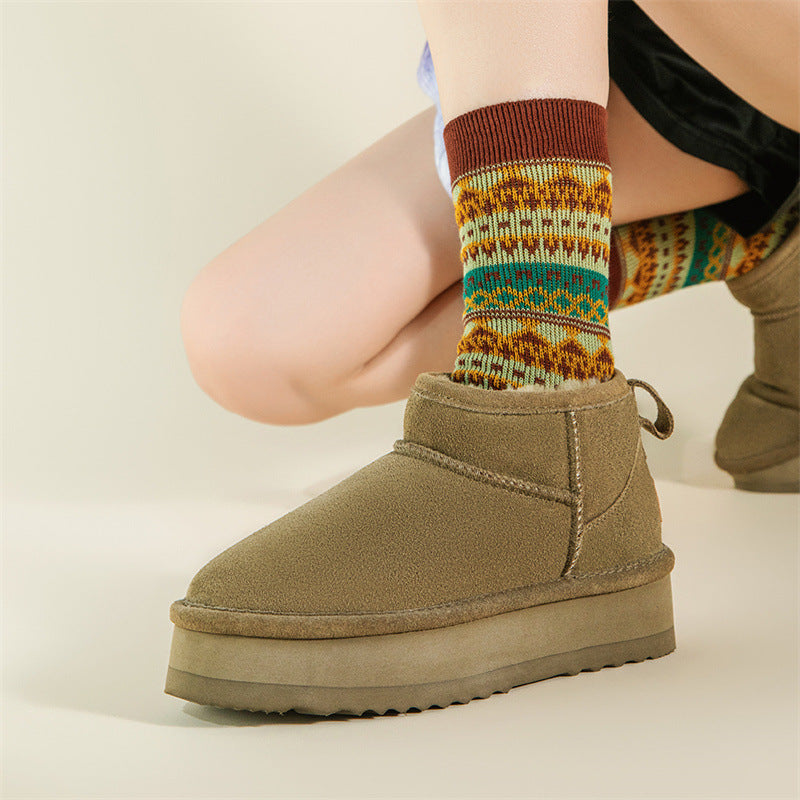 Olive suede slip-on snow boots with fleece lining and thick tread sole