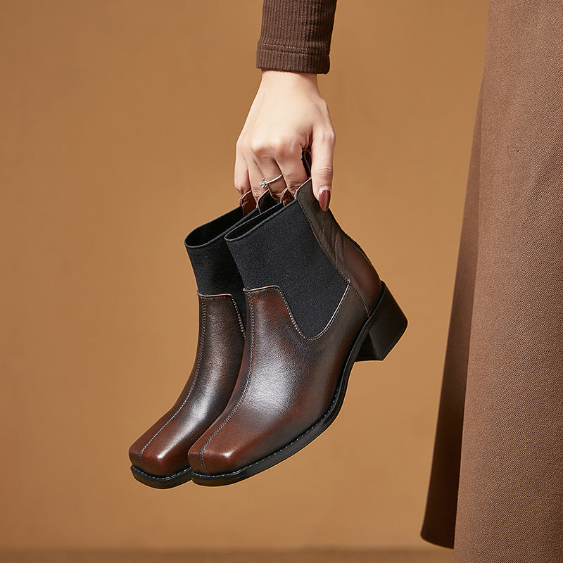 Women’s dark brown leather Chelsea ankle boots with elastic gore and low block heel
