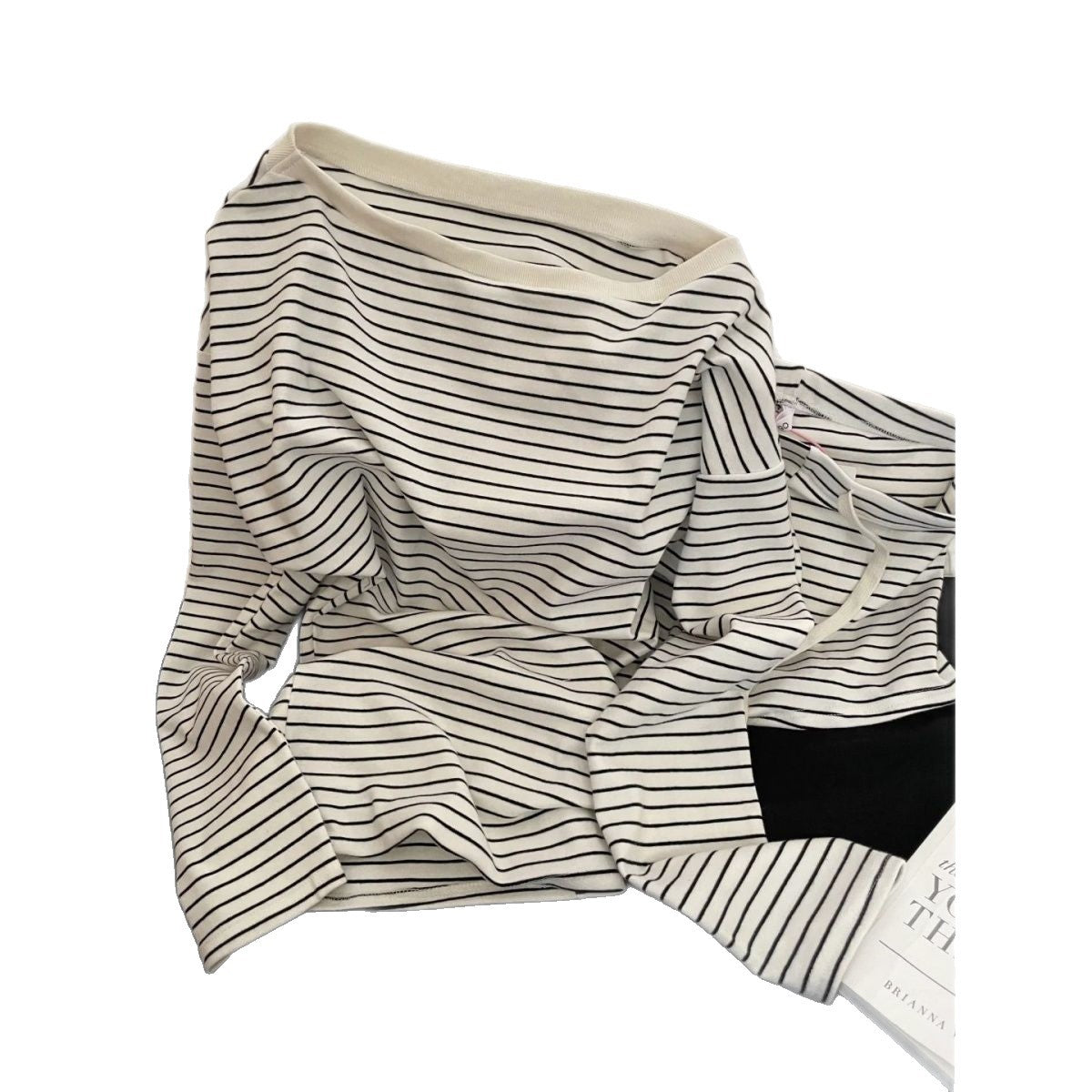 Women's black-and-white striped slanted-shoulder long-sleeve pajama set with matching shorts