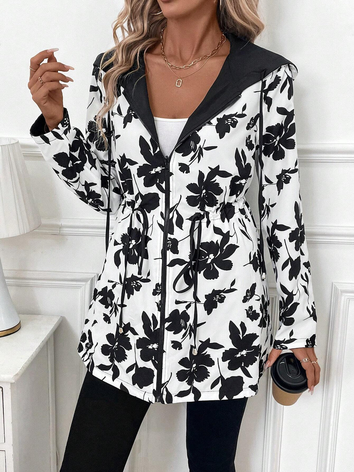 Reversible floral hooded zip jacket with black-and-white leaf print