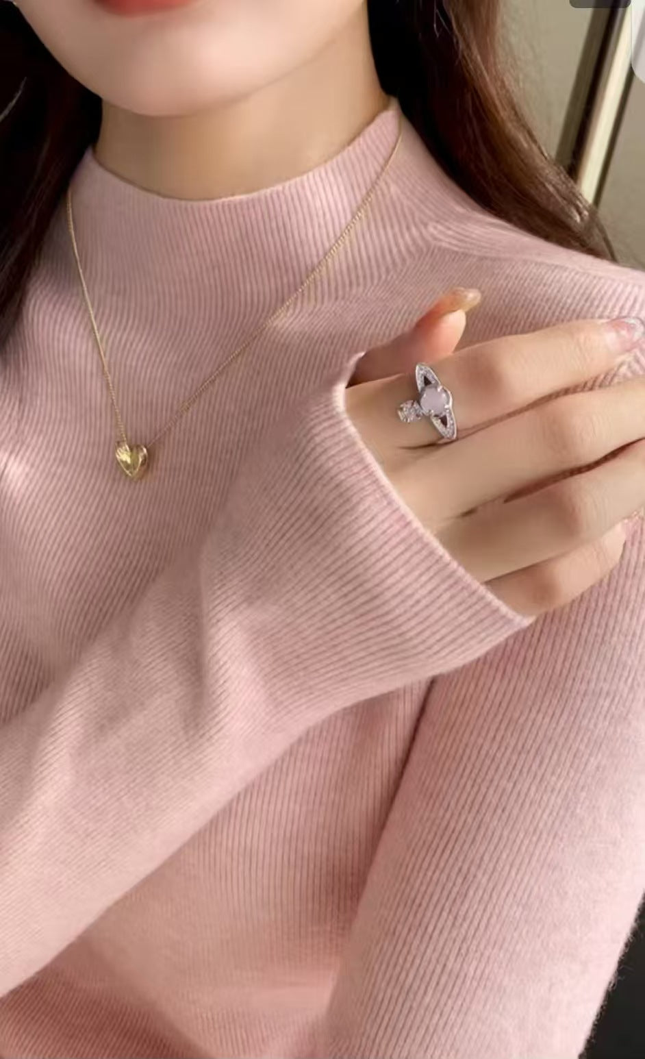 Light pink women’s mock neck slim-fit knit top, long sleeves