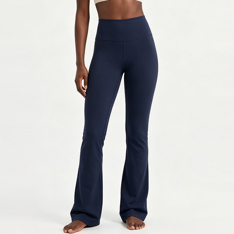 High-waisted flare yoga pants in navy blue, fitted waist with wide flared legs